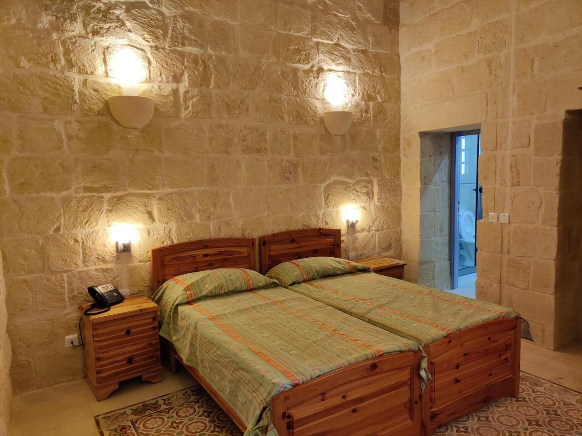 Country Inn Sannat Extérieur photo